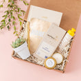 Load image into Gallery viewer, a box of beauty products and a succulent plant