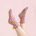 Load image into Gallery viewer, a pair of feet with colorful sprinkles on them