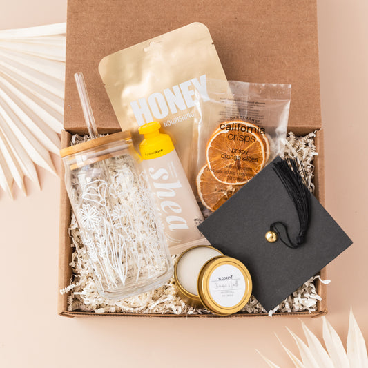 a graduation gift box filled with personal items