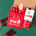 Load image into Gallery viewer, a red bag with a snowman and a snowman on it
