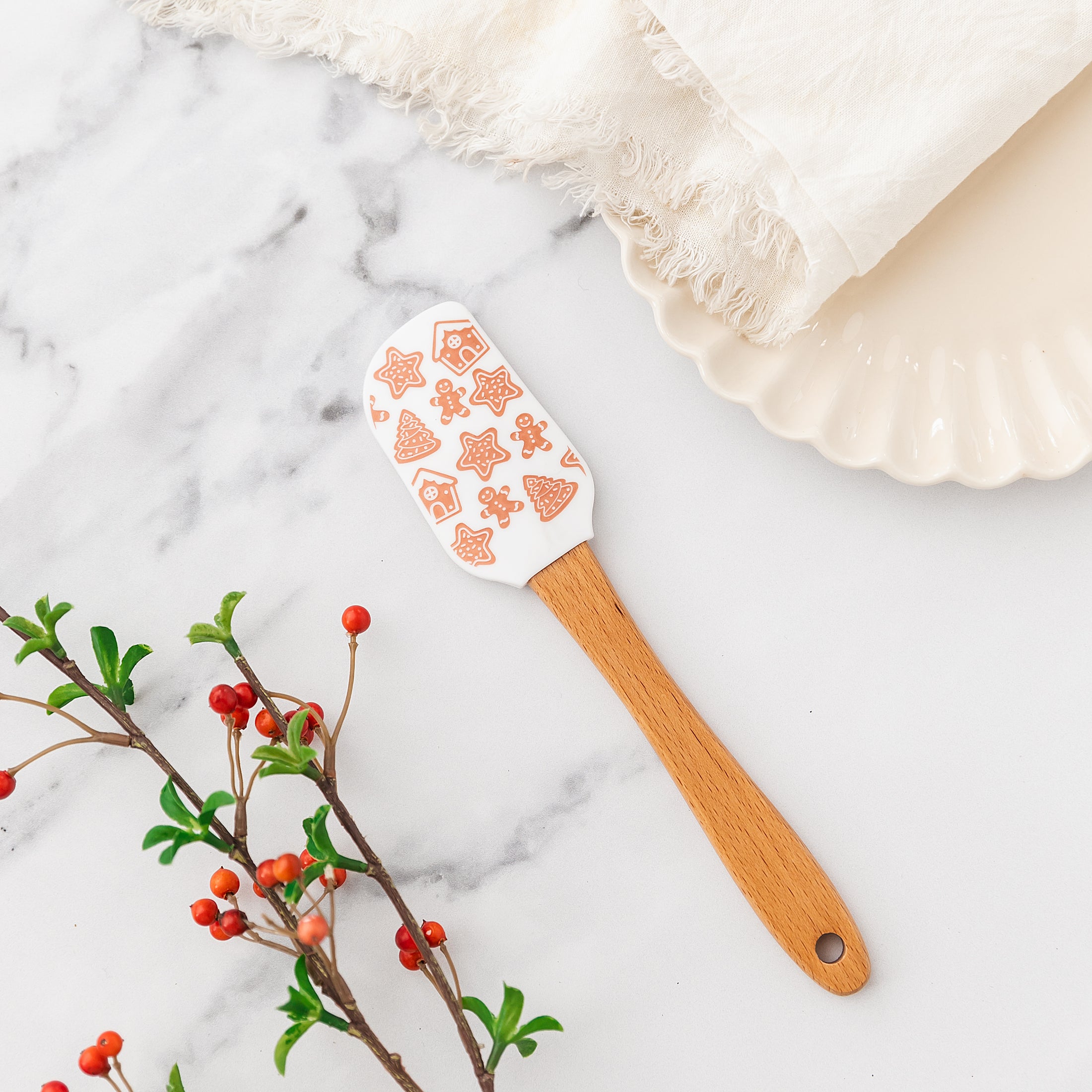 a wooden spatula sitting on top of a marble counter